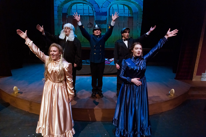 Central College students participating in a musical theatre production.